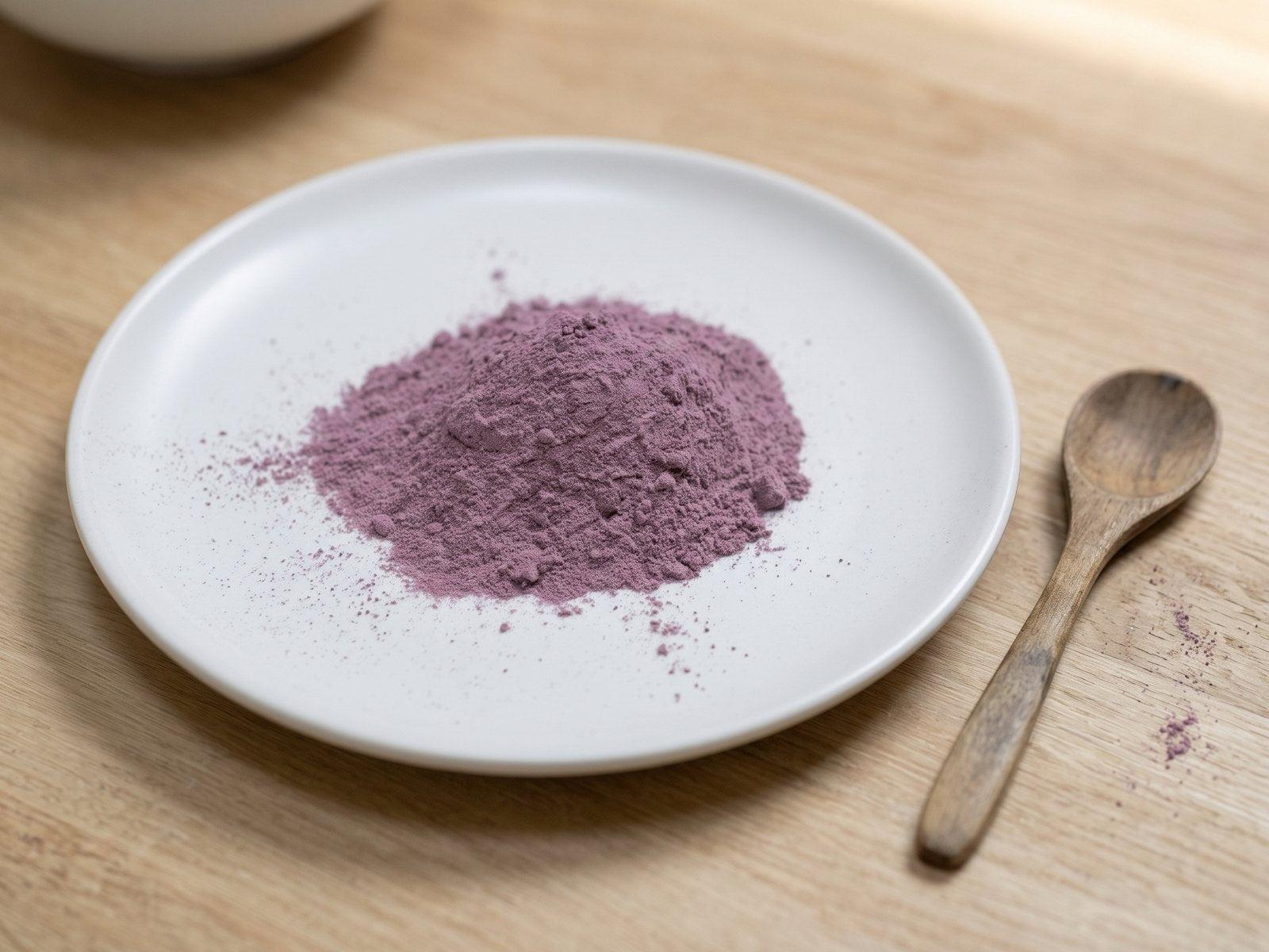 Fine, golden astragalus root extract powder with a wooden spoon
