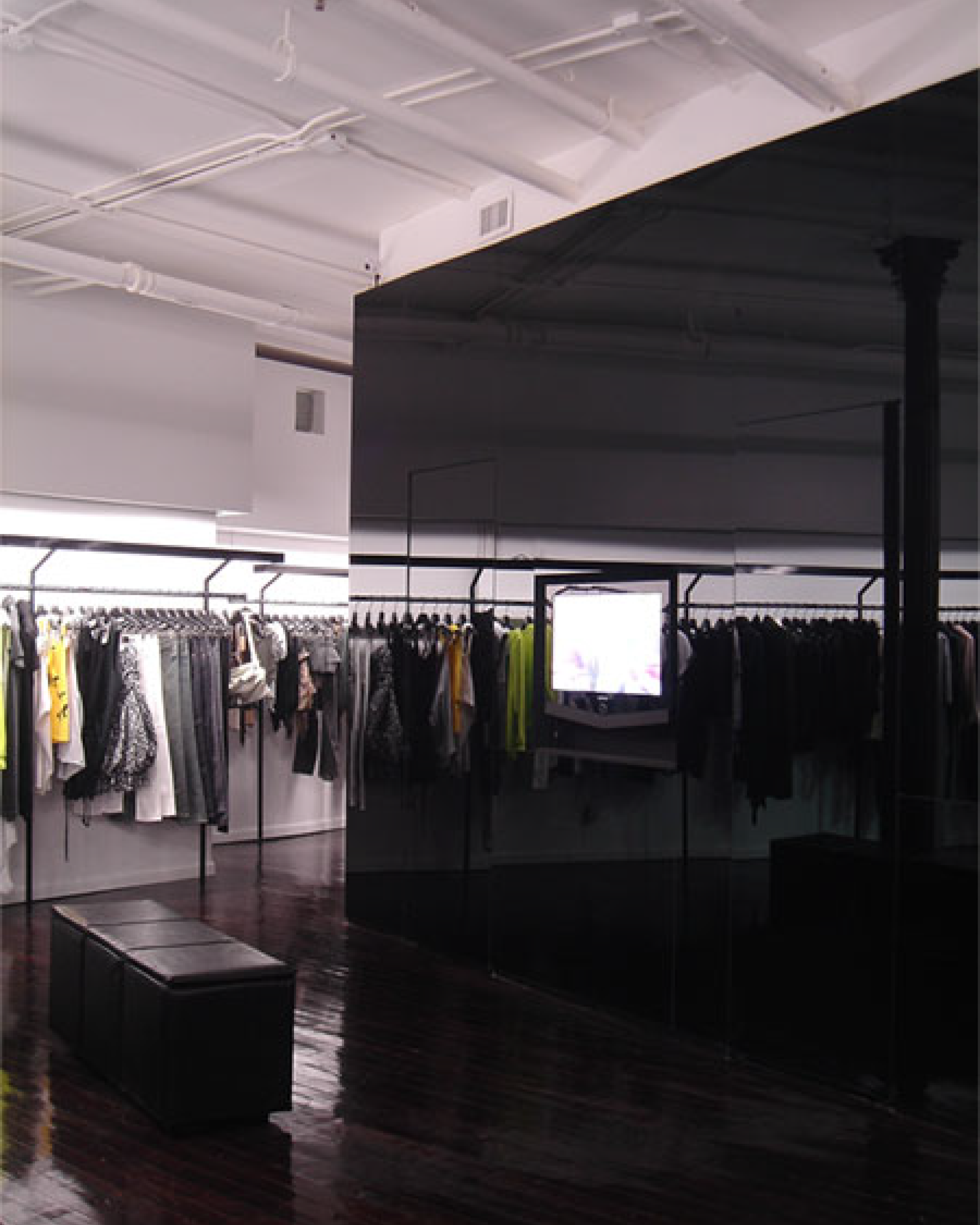 The black mirrored monolith of the second Seven New York at 110 Mercer Street.