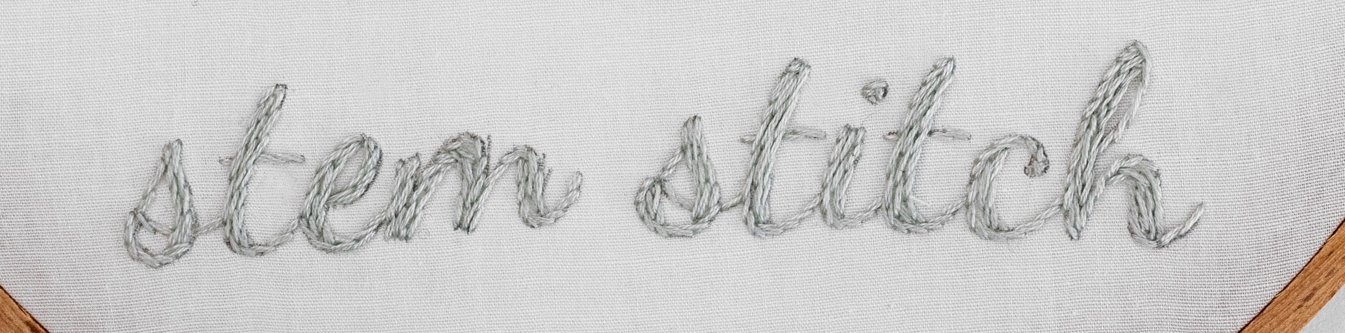 This is the word 'stem stitch' is stitched using stem stitch.