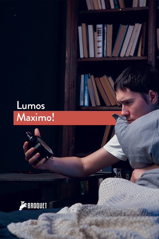 man holding an alarm clock in bed, books in the backround, broquet logo, text reads: Lumos Maximo!