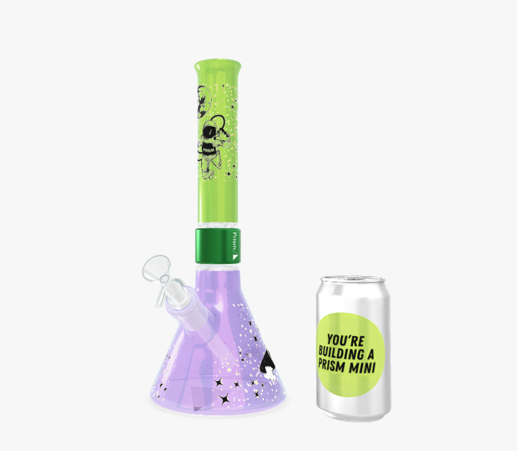 Screenshot of the Prism MINI 3D Custom Builder showing a modular bong setup with the Spaced Out decal collection, a slime green beaker base, and grape jolly rancher accents.