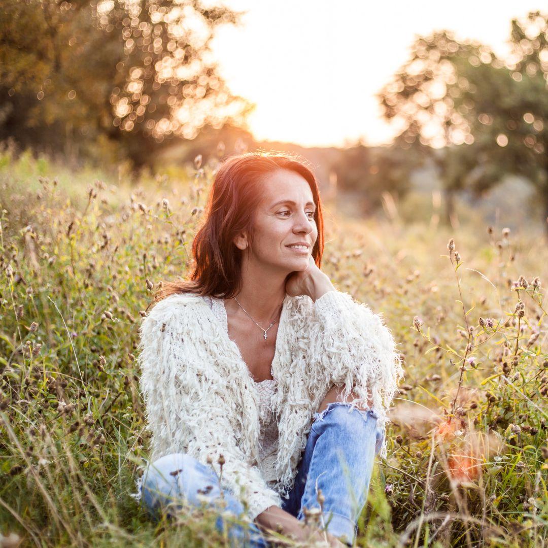 Woman sitting in a field