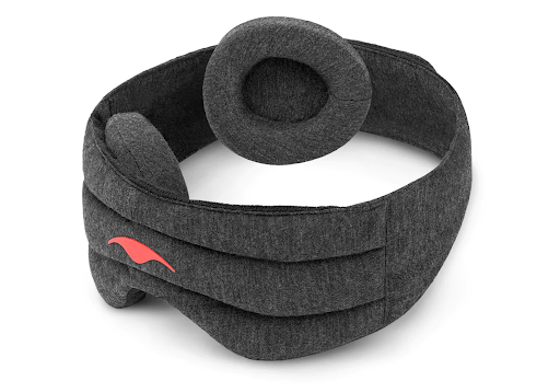 A dark gray weighted sleep mask with detachable eye cups positioned in the interior of the head strap.