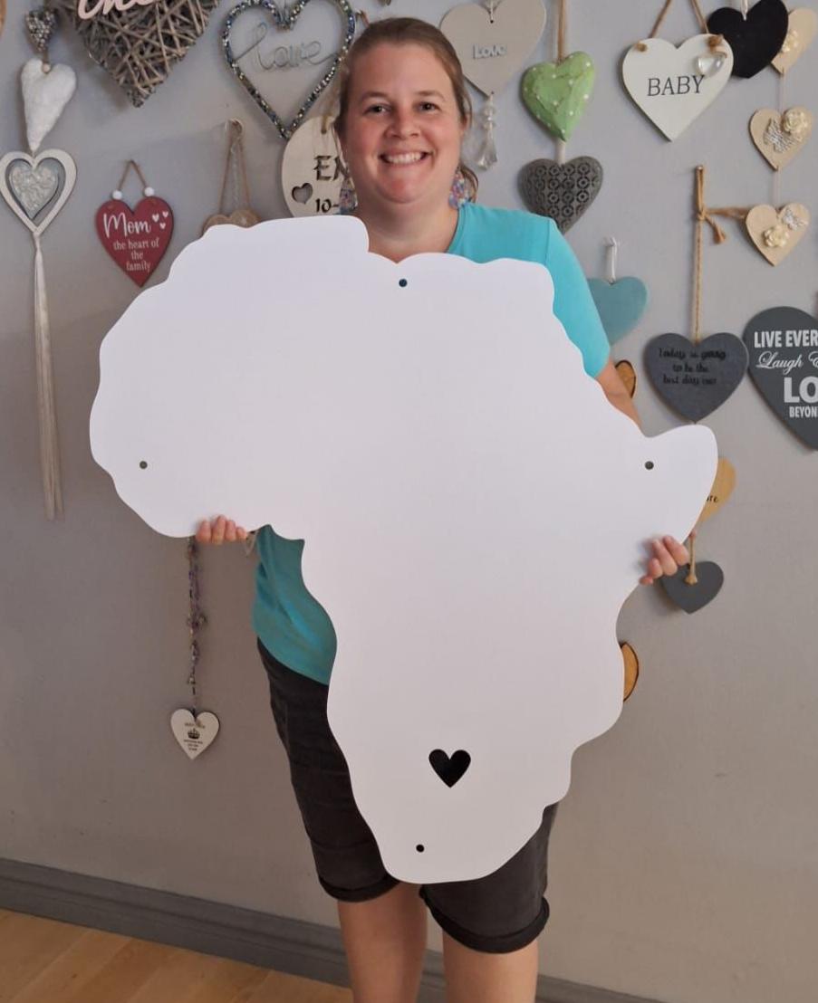 Previous Winner of Large White African Map Customer Holding the map