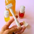 hand holding microneedle dermastamp