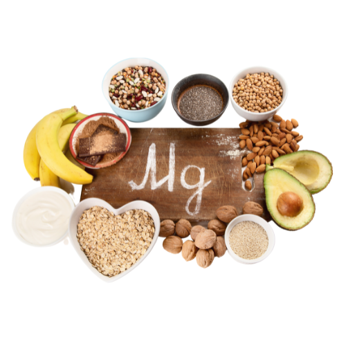 wooden board with Mg written in chalk on it. surrounded by various magnesium-rich foods.