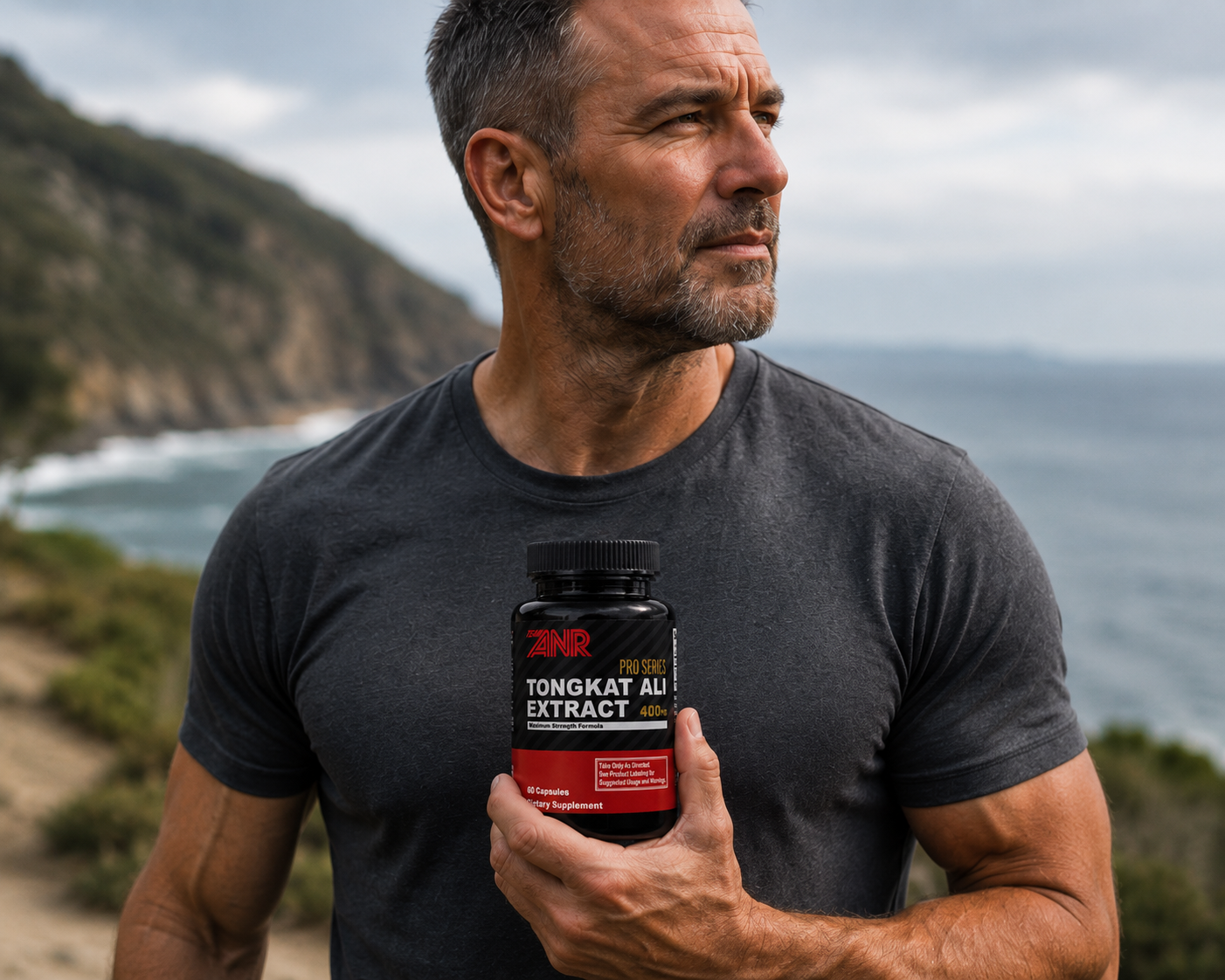 A lean, muscular man with arms crossed who uses Adaptophen to increase muscle and boost testosterone
