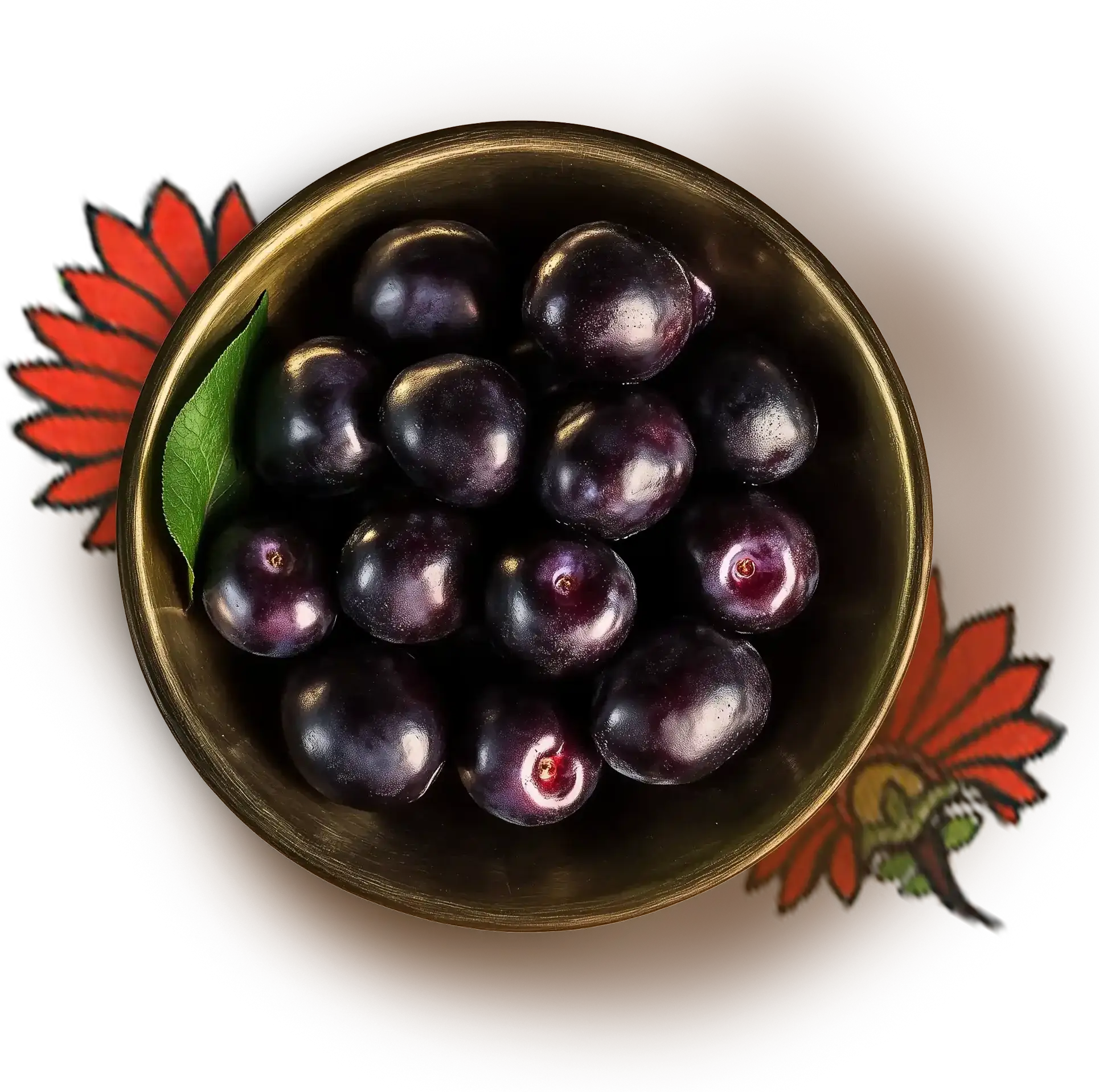 Black plums kept in a brass bowl over an artwork of a pink flower