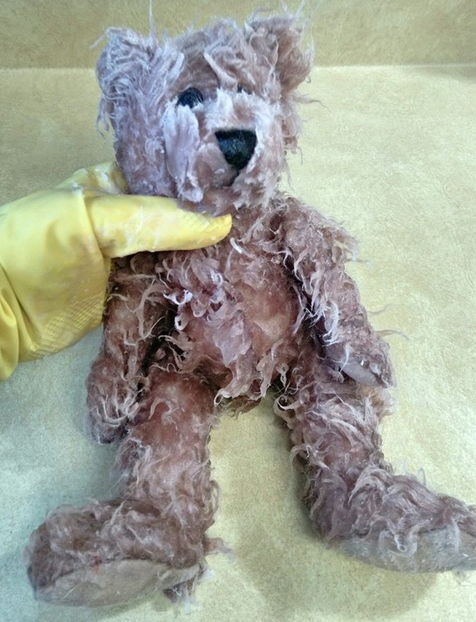 Teddy bear after he was dipped into wax
