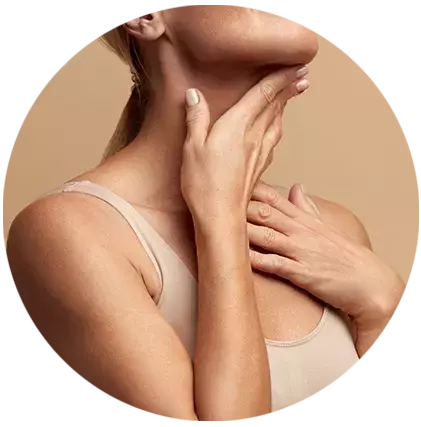 a woman gently massaging her face