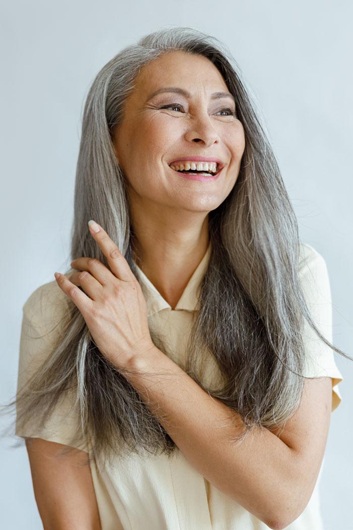 Happy woman with long hair