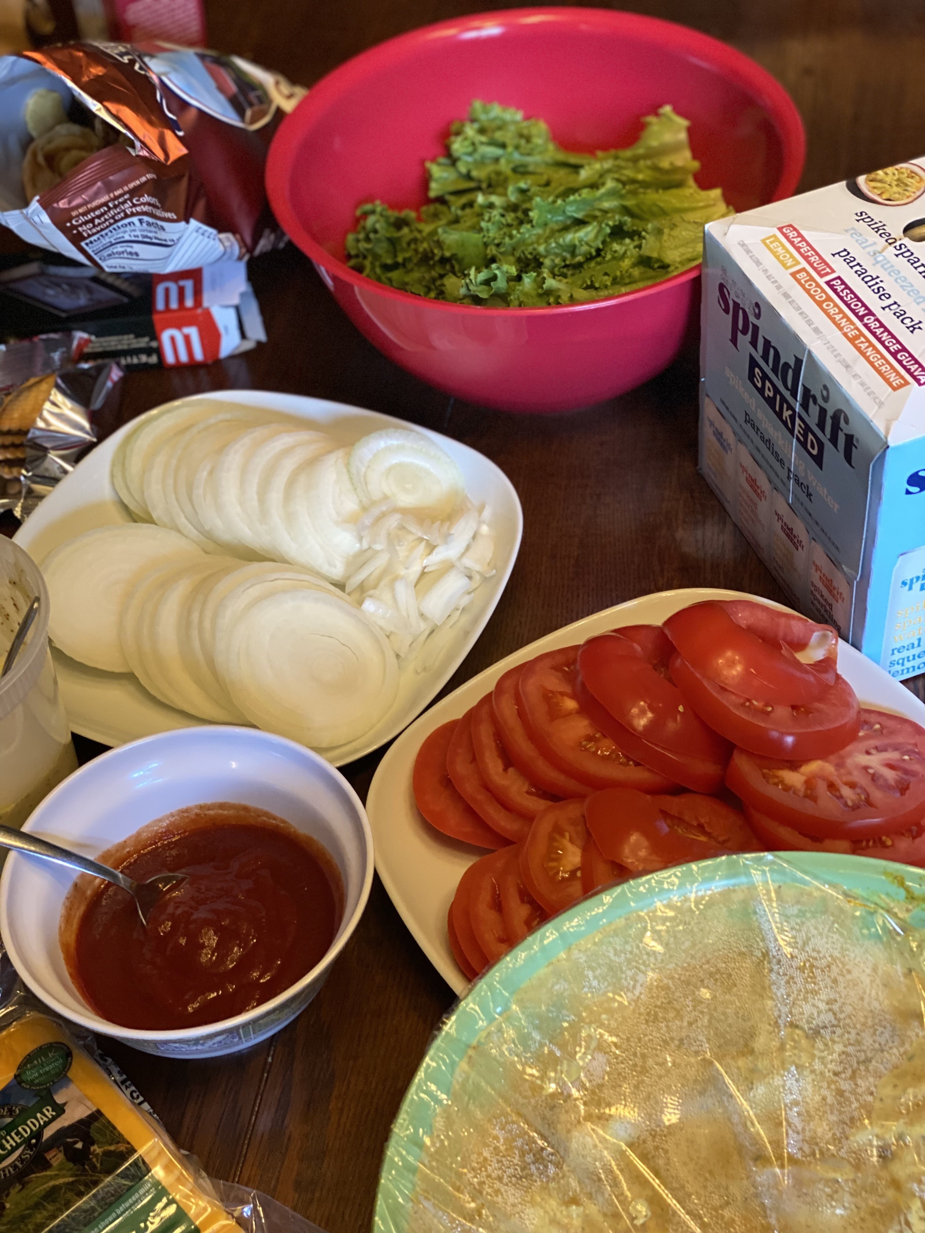 Cut tomatoes, onions, mayo, and ketchup