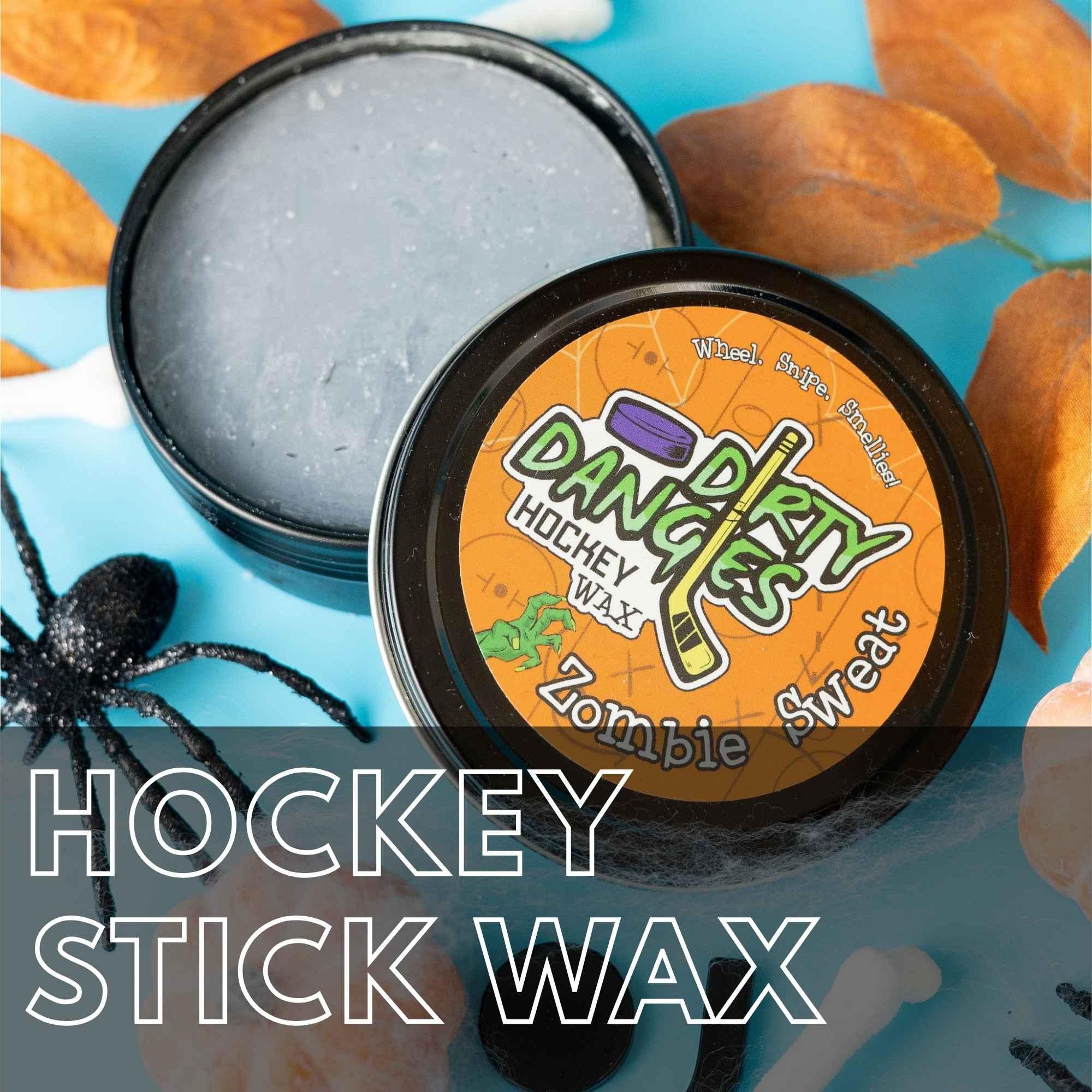 Dirty Dangles hockey stick wax tin displayed with hockey-themed seasonal decorations. Hockey Stick Wax