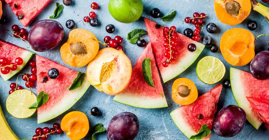 table full of summer citrus fruits