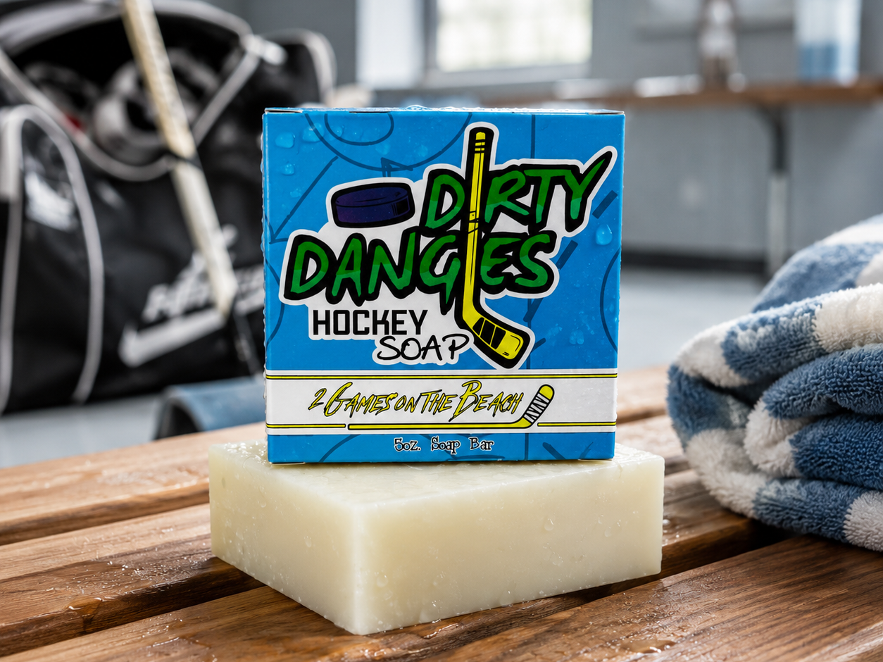 2 games on the beach hockey soap bar on a wooden bench inside a locker room with hockey gear in the background