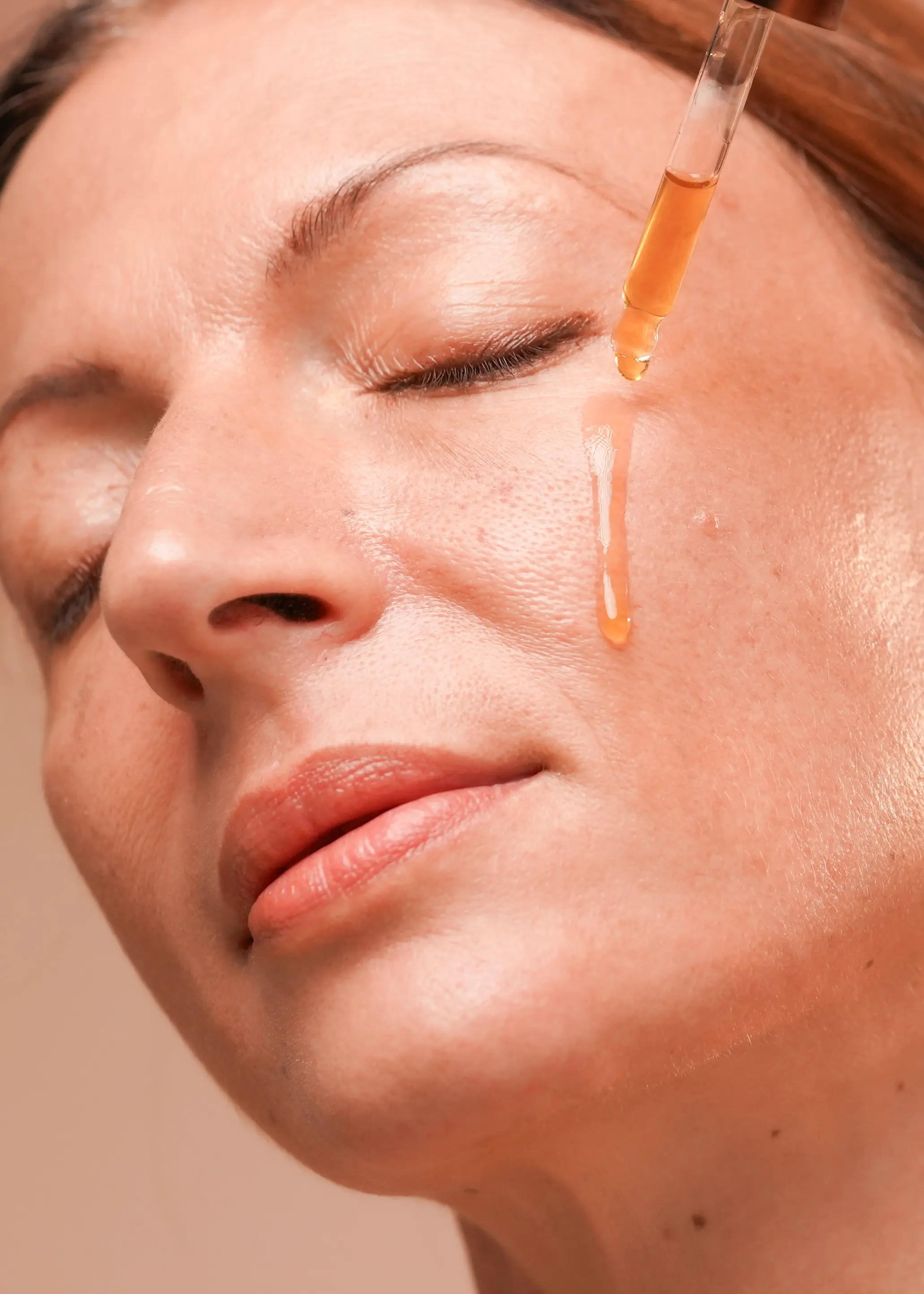 applying face elixir