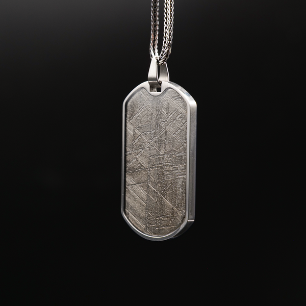 The Meteorite Dog Tag is a meteorite necklace that is crafted with real meteorite