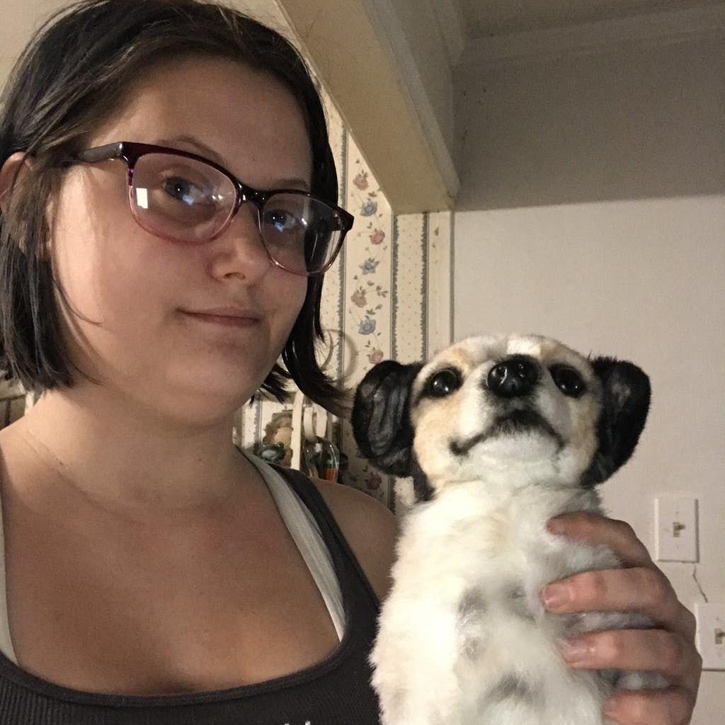 Customer with their pet plush creation