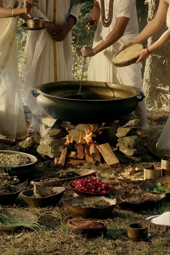 A scene with authentic method of preparation of ayurvedic oils