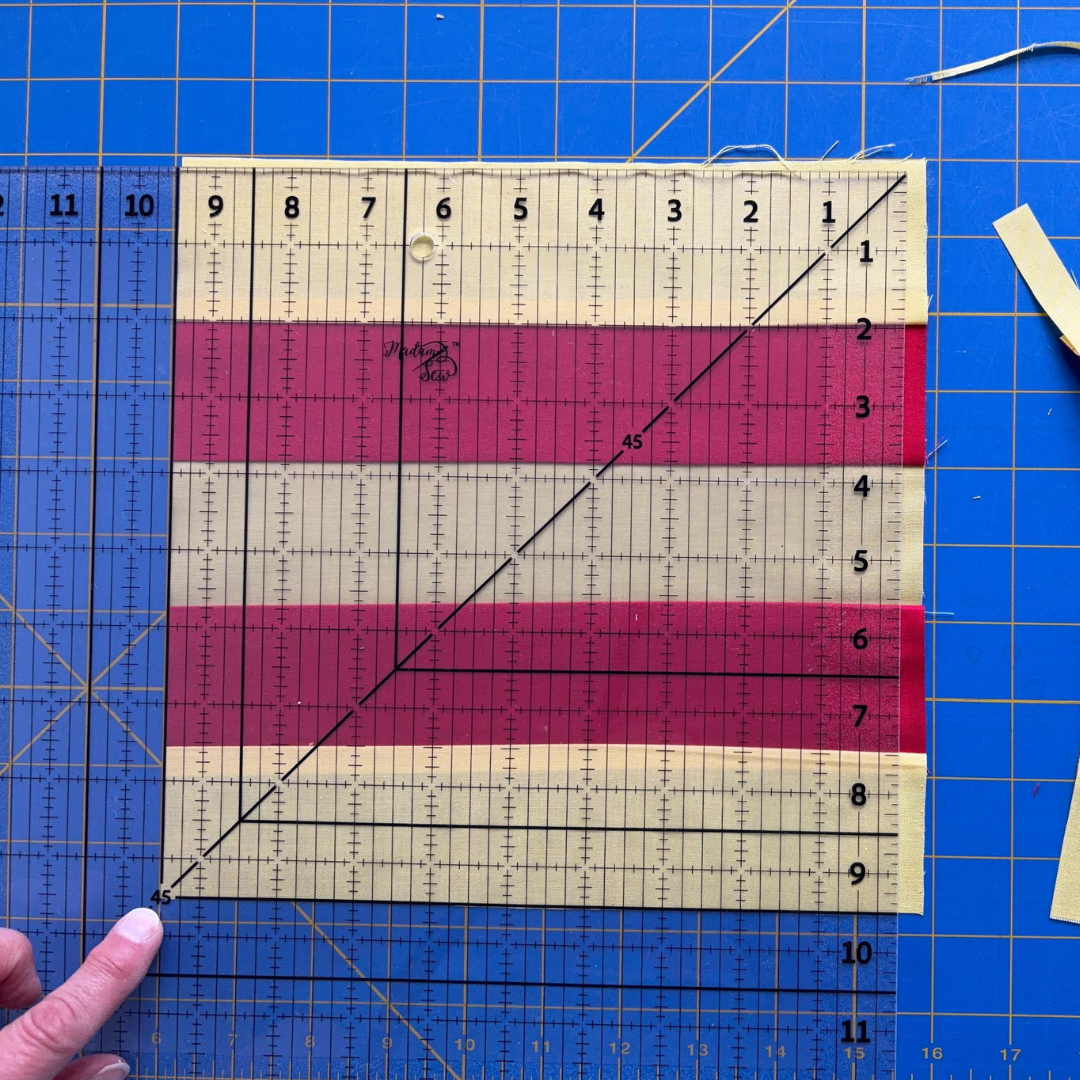 The 45 degree line lined up with the corner of the block’s two cut edges.