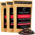 Three 12oz bags of Lone Wolf Coffee’s Lonestar Medium-Dark Roast Whole Bean coffee bag product photo