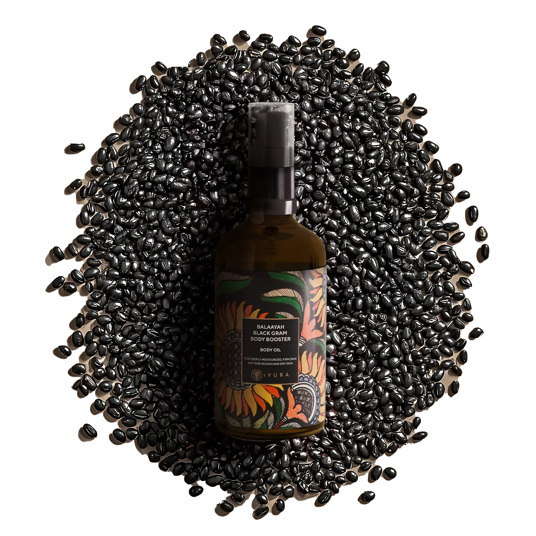 A bottle of Balaayah surrounded by black-grams