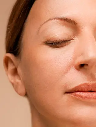 woman face showing even tone skin