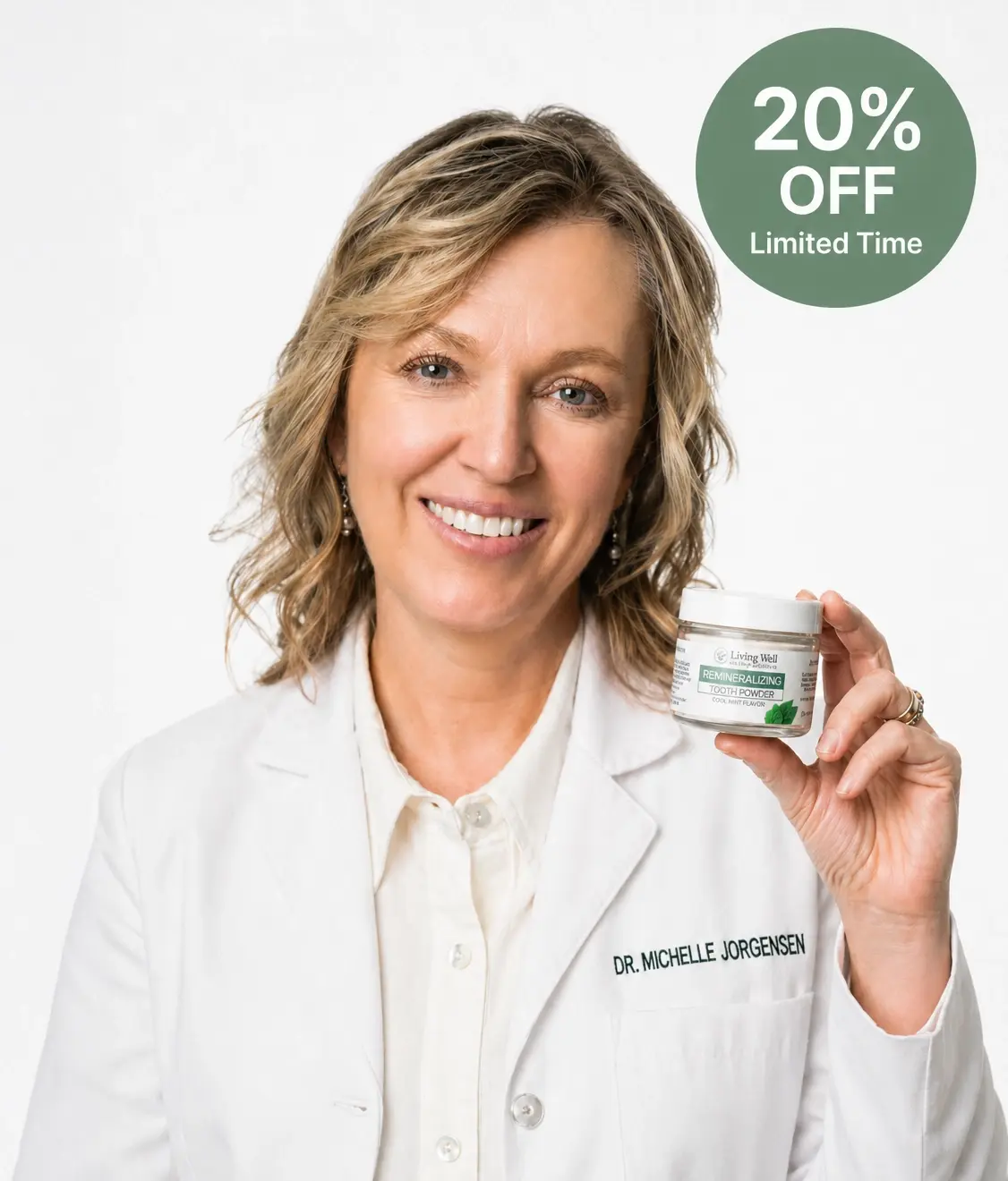 Dr. Michelle holding Living Well Tooth Powder