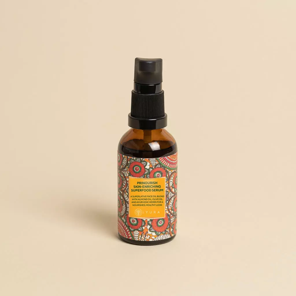 A bottle of Prinourish kept on a beige color background