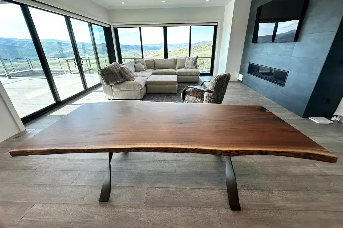 Live edge walnut table with twisted X steel base