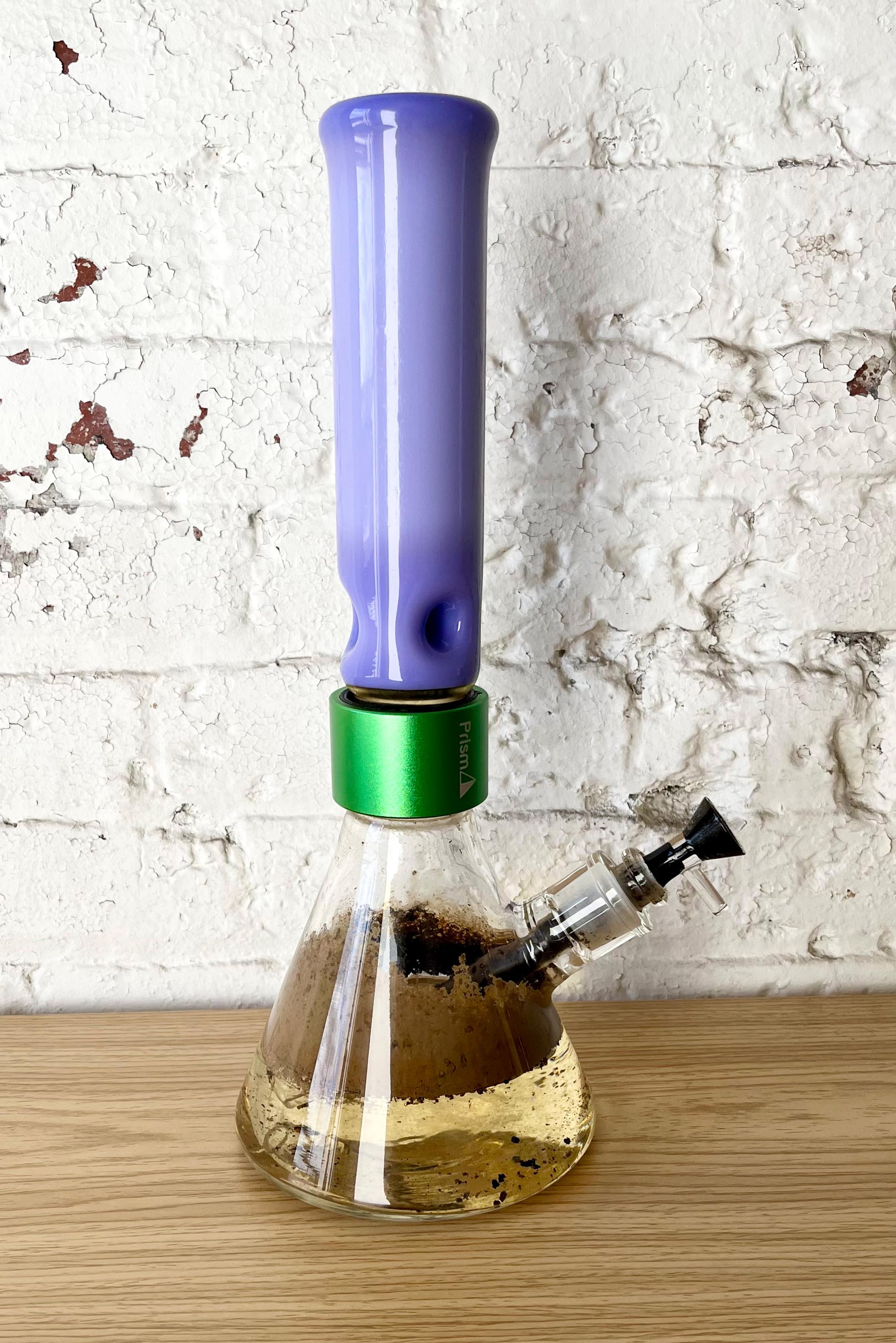 "Prism Single Stack Beaker Bong filled with dirty bong water, showcasing the importance of regular bong water changes for better health and smoother hits."
