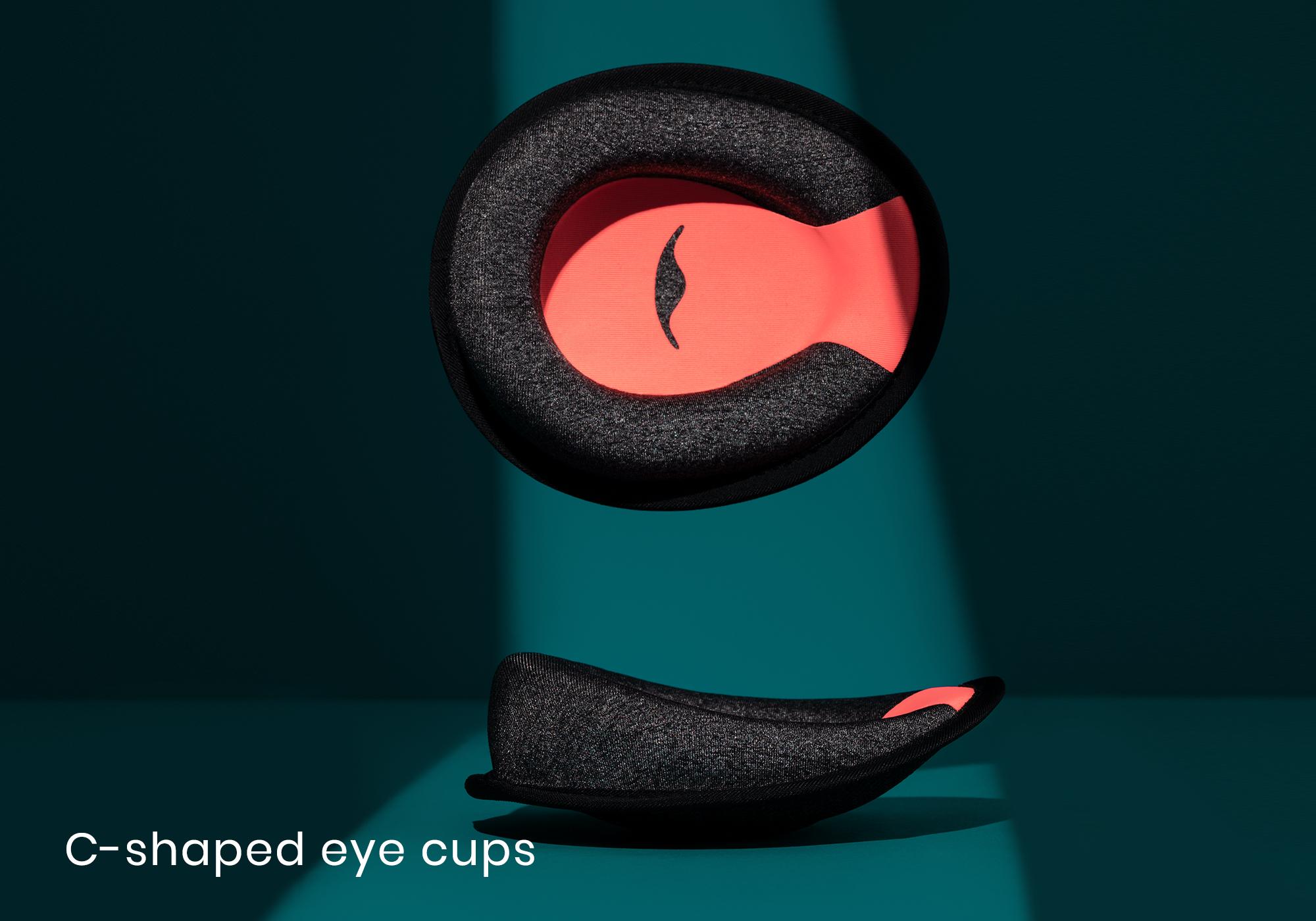 Black and red C-shaped eye cups for a Bluetooth sleep mask with headphones.