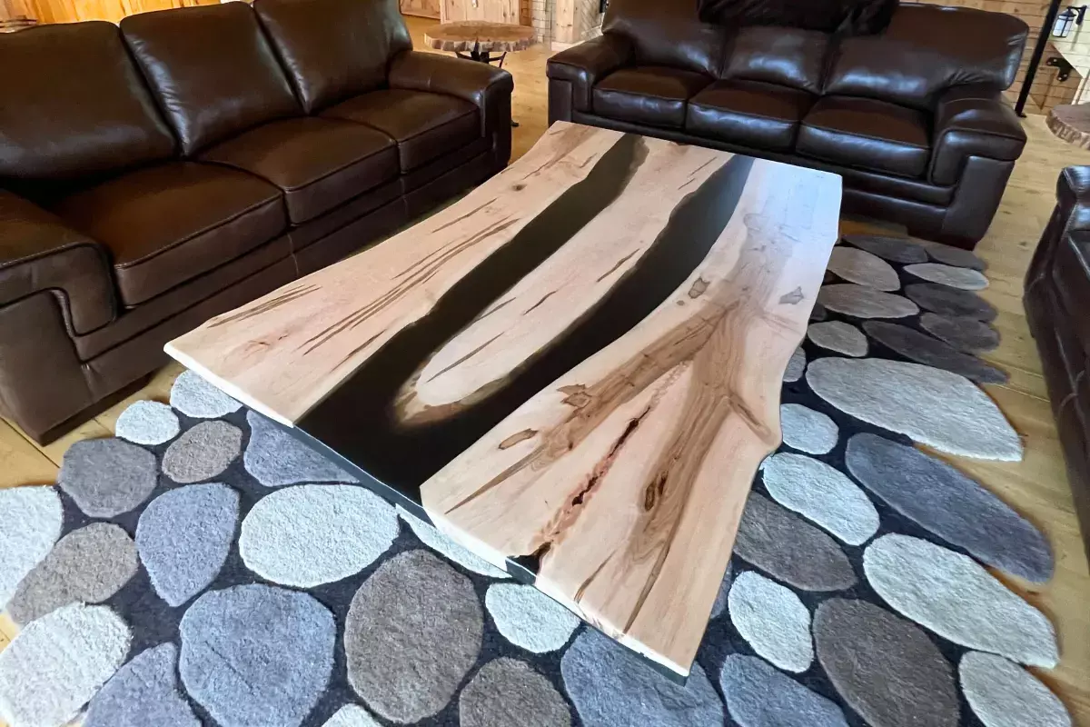 Live edge wormy maple coffee table with natural voids and steel base