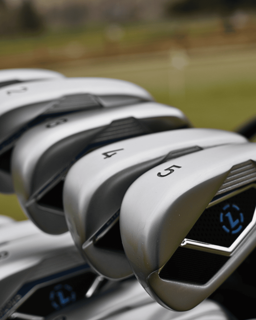 Multiple Laz2 Irons displayed in golf bag