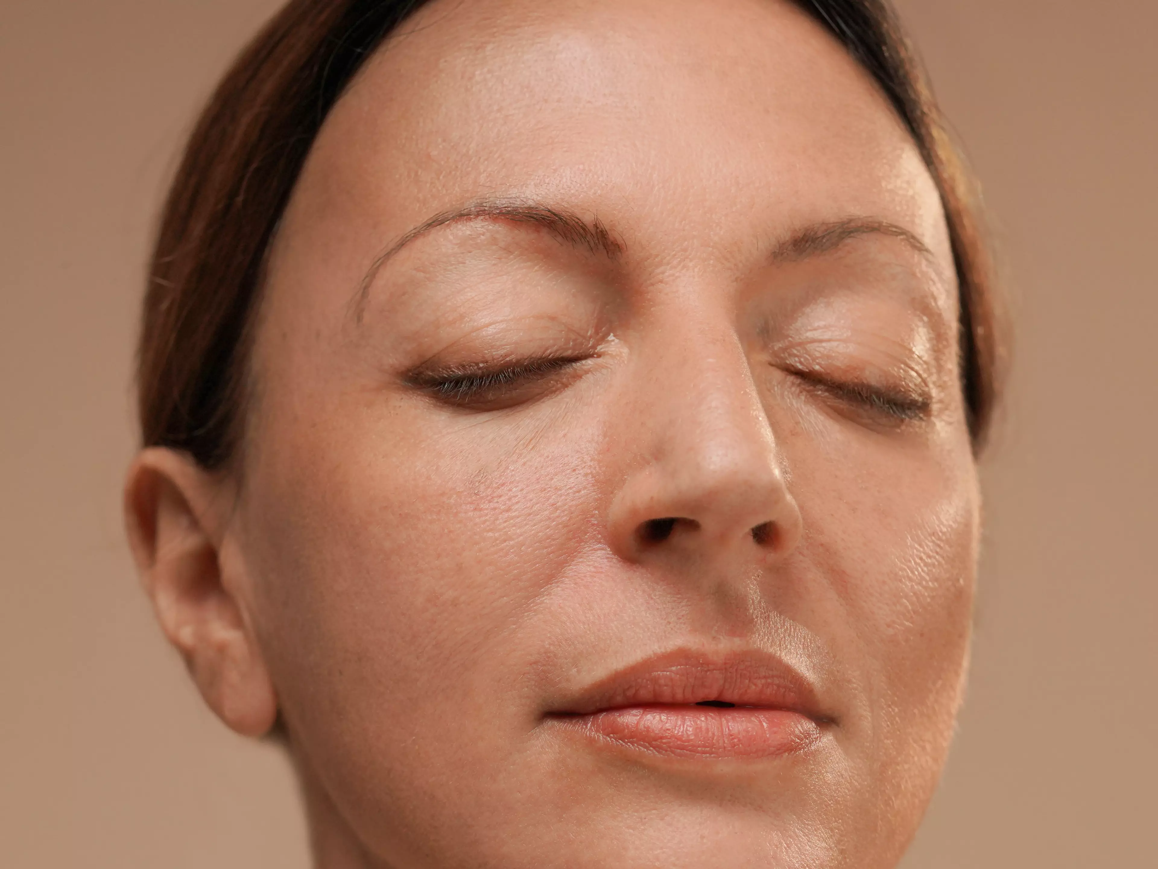 A woman looking happy using the product