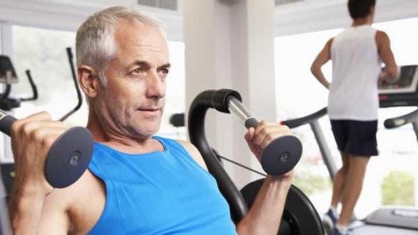 Man Exercising In Gym Man Running On Treadmill