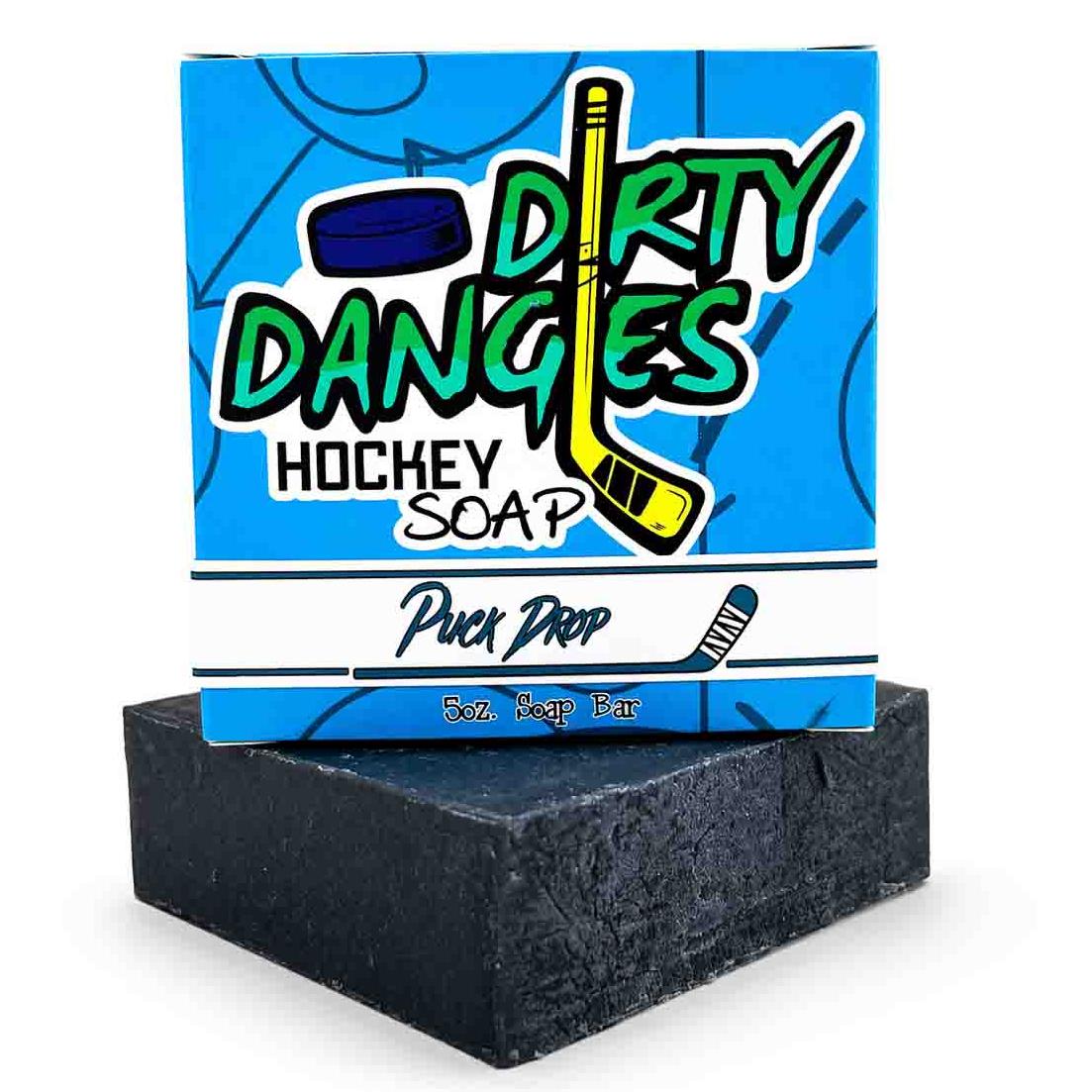 Dirty Dangles puck drop hockey soap bar with product box on a white background.