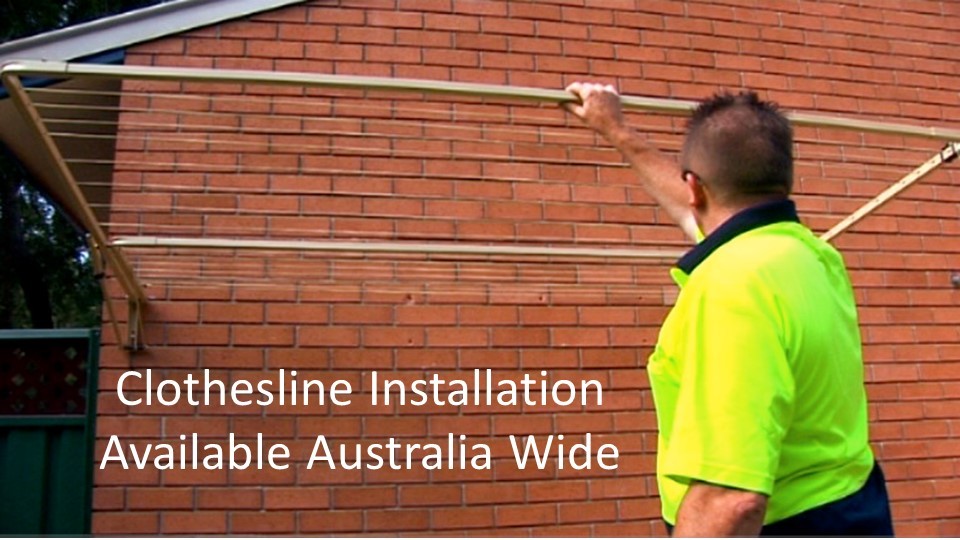 130cm wide clothesline installation service showing clothesline installer with clothesline installed to brick wall