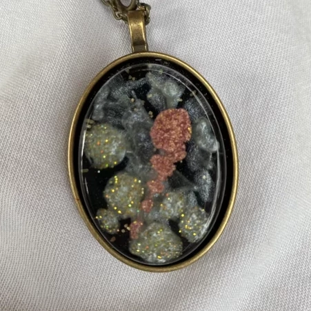 Custom jewelry made with epoxy resin and pearl pigment from Art 'N Glow.