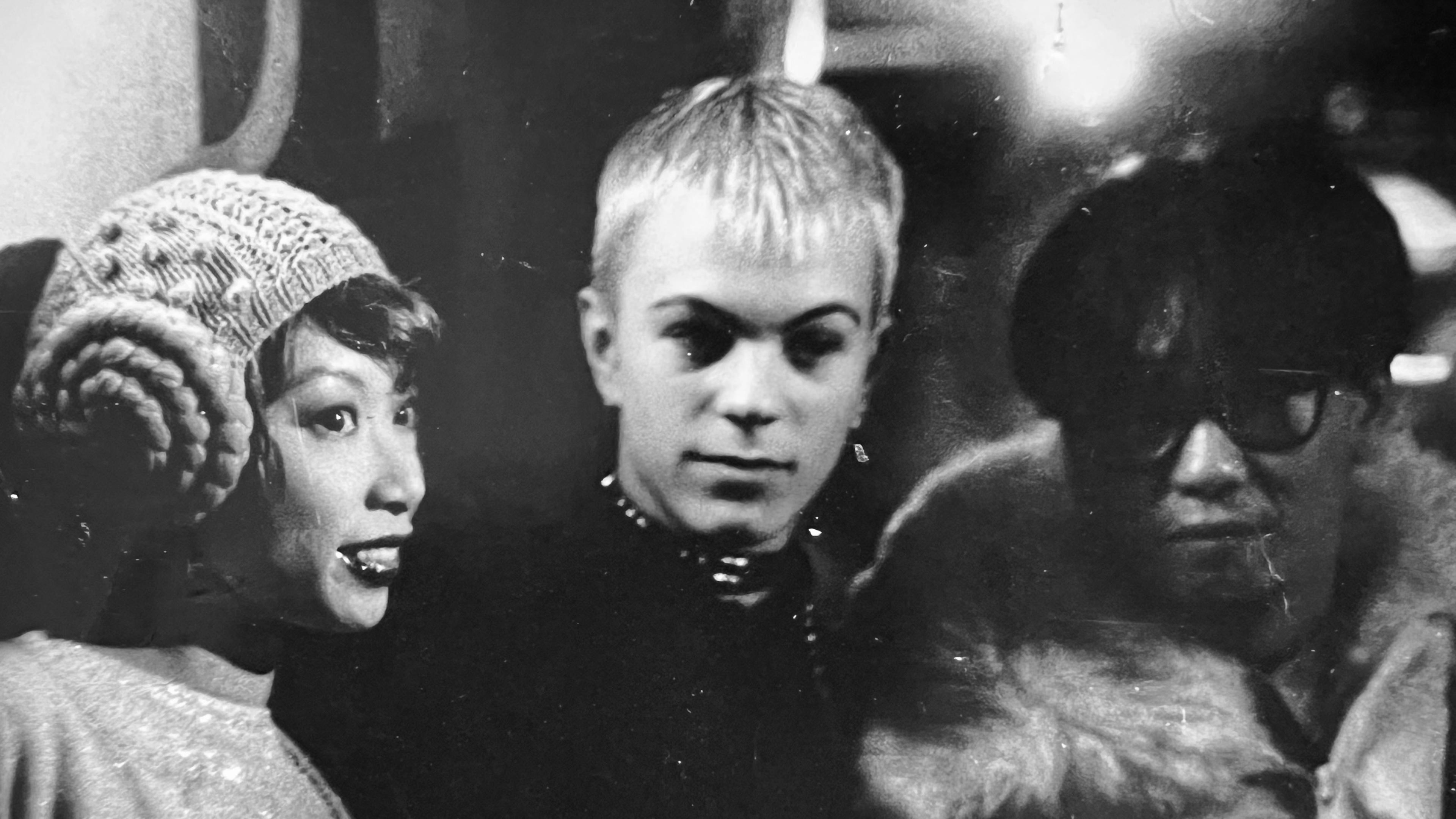 Joseph Quartana between members of Japanese pop group Pizzicato Five at the Tunnel