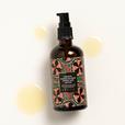 Keranya Pure Black Seed Potent Hair Potion bottle with some oil drops