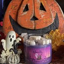 Ghostly Mansion Candle with Halloween Decorations