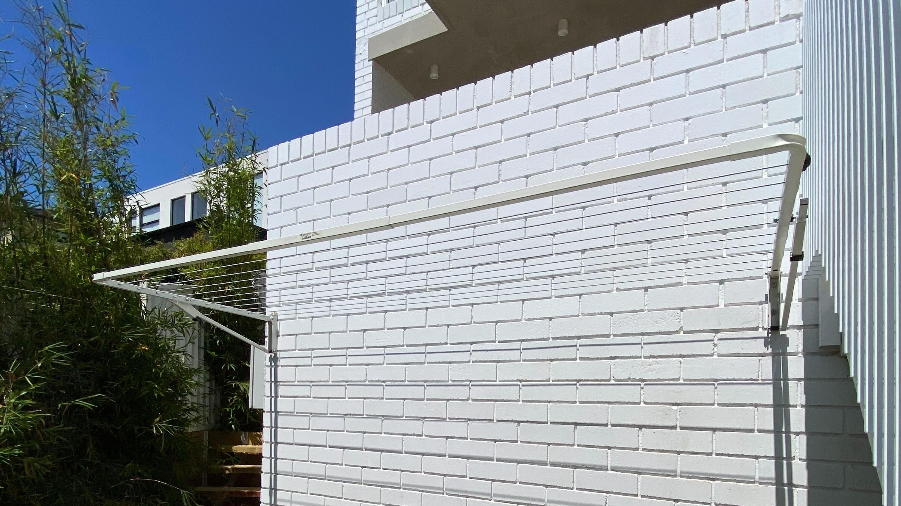 What Are the Best Fixings for Attaching a Clothesline to a Brick Wall?