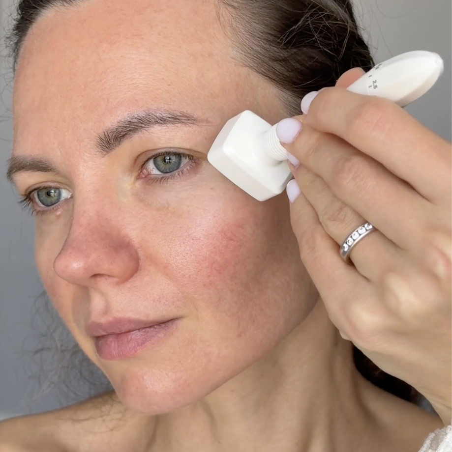 woman using microneedle derma stamp