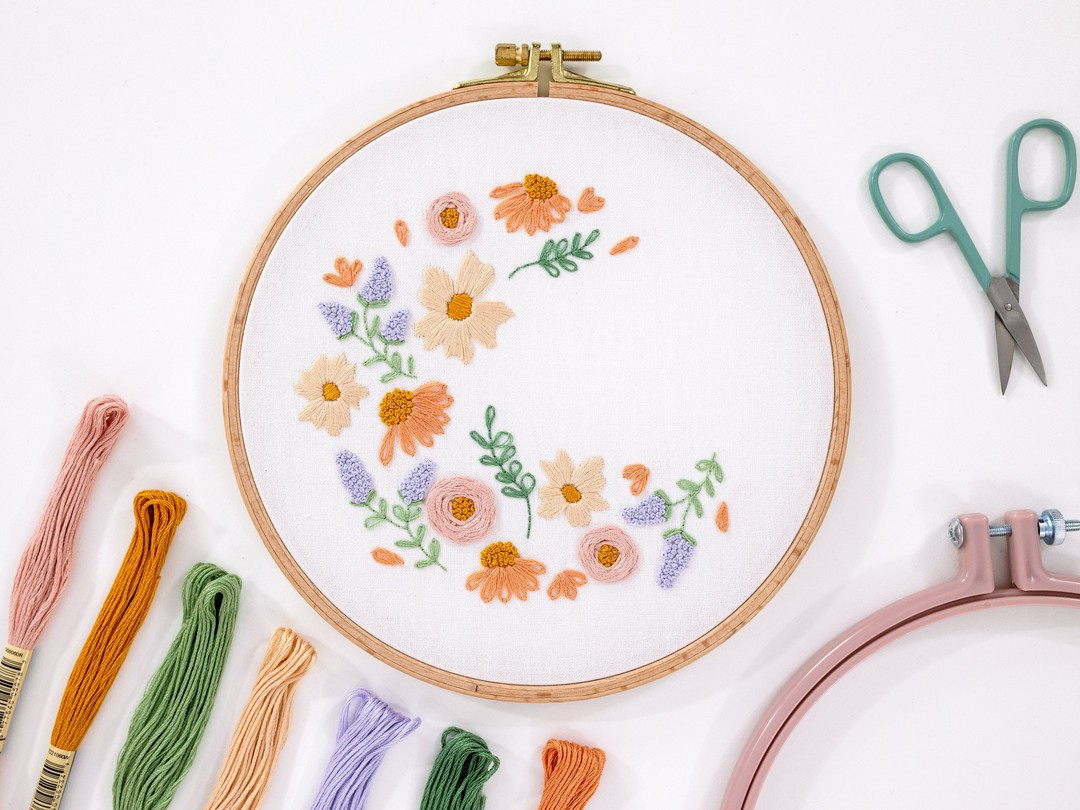 This is a beginner embroidery pattern, Blooming Lovely, framed in a hoop. This is available for purchase from the Clever Poppy Shop with the Modern Embroidery Foundations Course.