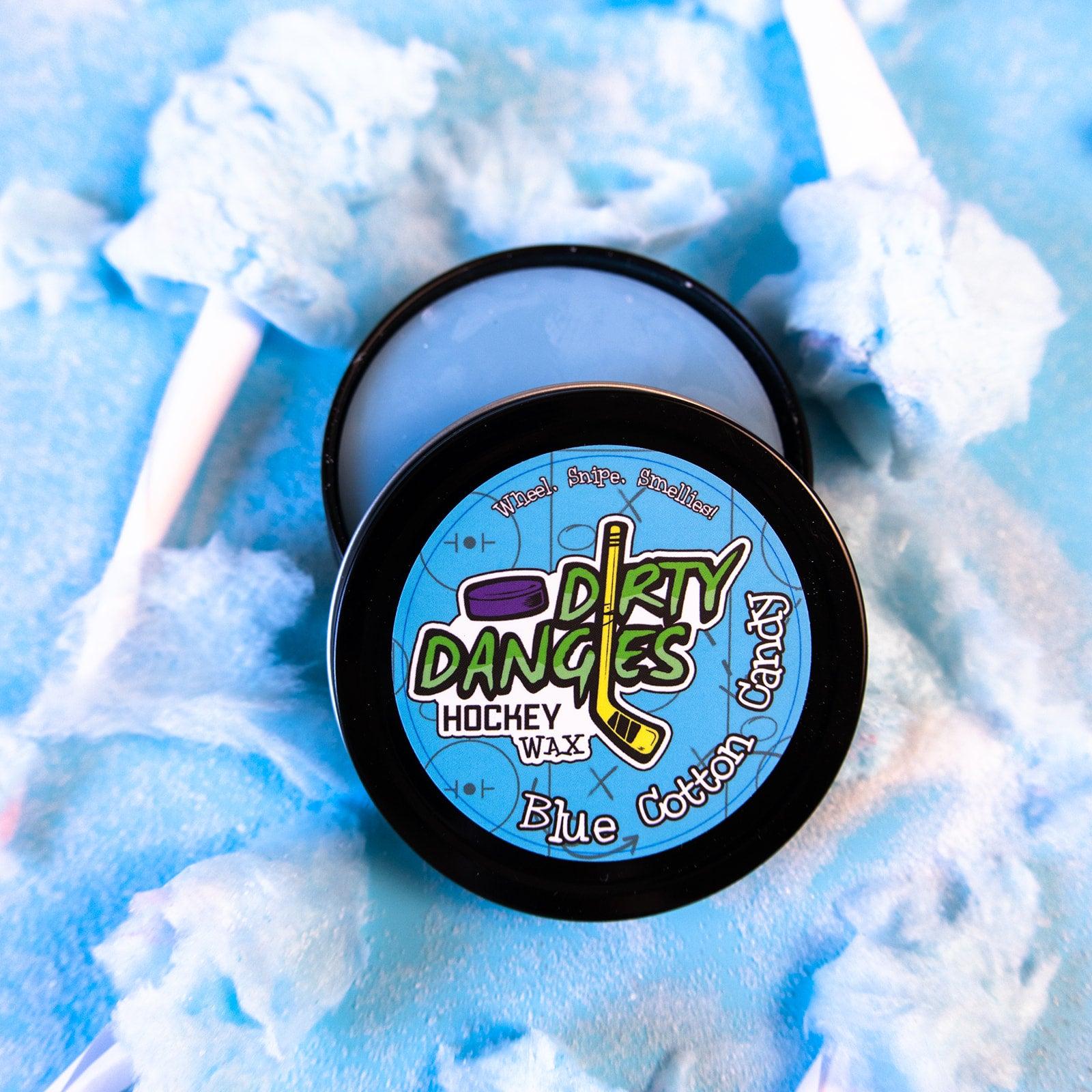 blue cotton candy scented hockey stick wax on a blue background with blue cotton candy
