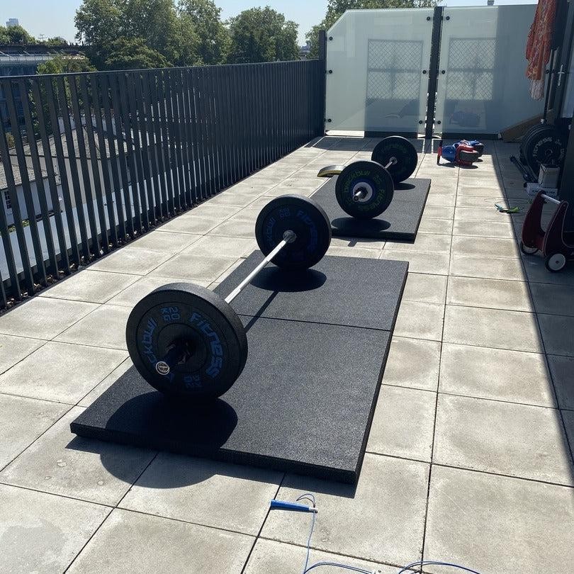 43mm mats outside with barbells
