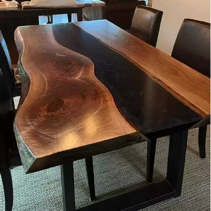 live edge walnut table with black epoxy river