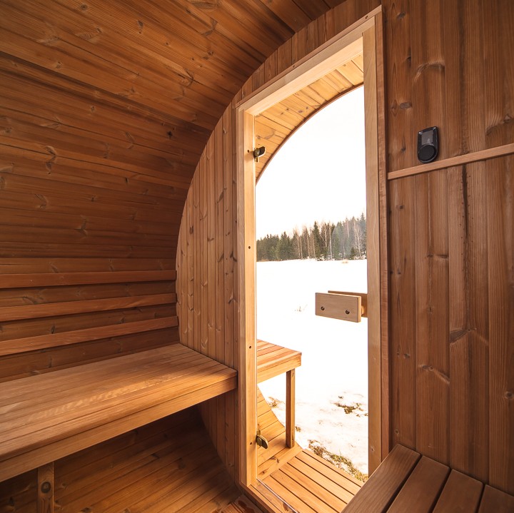 IMAGE FROM THE INSIDE OF A THERMORY BARREL SAUNA WITH THERMALLY MODIFIED WOOD.