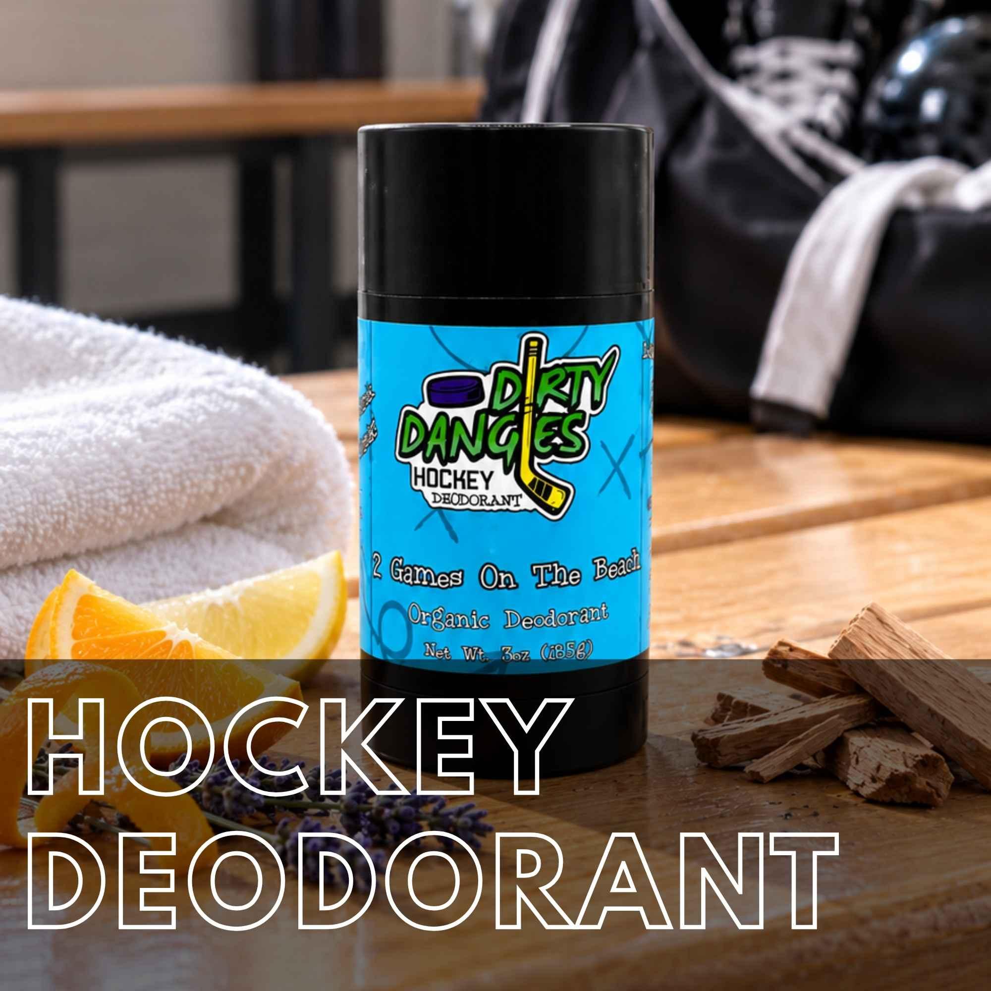 Dirty Dangles hockey deodorant displayed with towels and fresh scent ingredients. Hockey Deodorant